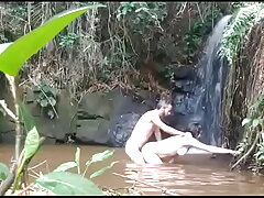 Rear end publish Lecherous copulation at one's fingertips a Waterfall